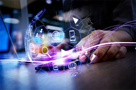 Software developer in Mumbai working on a project with a glowing digital globe representing technology and innovation.